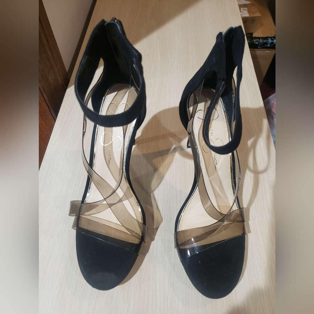 Jessica Simpsons black high heel shoe.